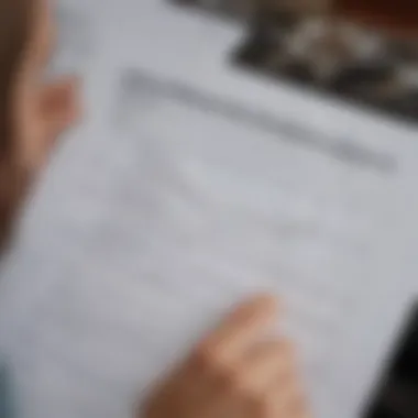 A close-up view of a job seeker reviewing a resume and preparing for an interview