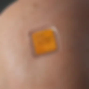 Close-Up of Glucose Patch Monitor Close-up view of a glucose patch monitor on a skin surface