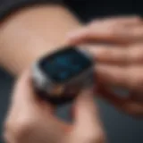 Close-up of a wearable oximeter displaying oxygen levels