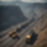 Aerial view of coal mining operations showcasing large machinery and landscape disruption.